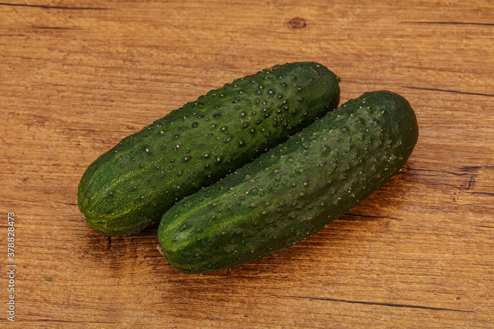 Green fresh cucumbers over background Green fresh cucumbers over background