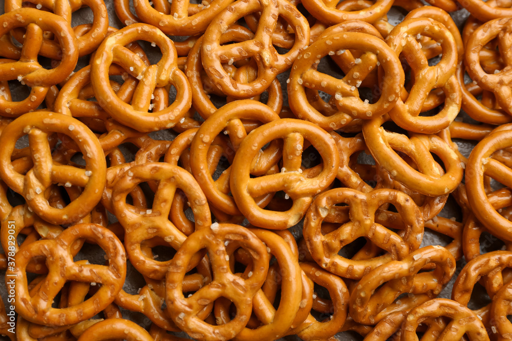Many delicious pretzel crackers as background, top view Many delicious pretzel crackers as background, top view