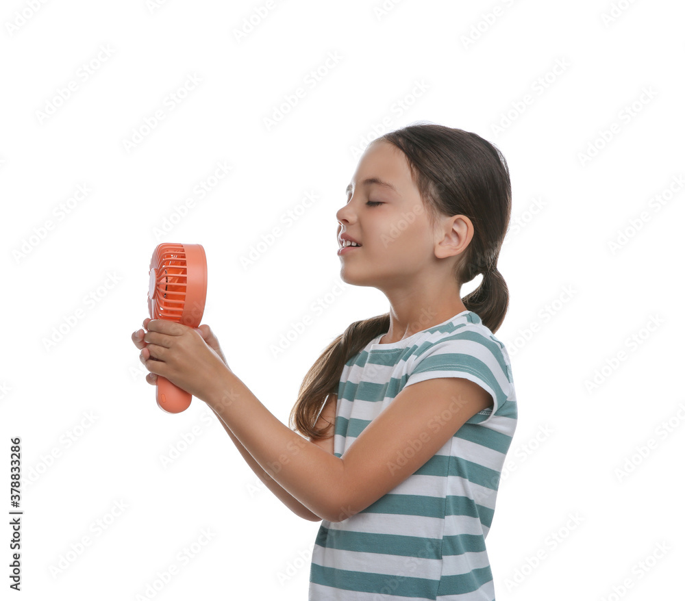 Little girl enjoying air flow from portable fan on white background. Summer heat Little girl enjoying air flow from portable fan on white background. Summer heat