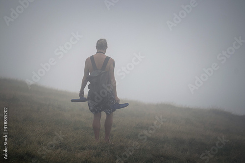 Man walking in the clouds