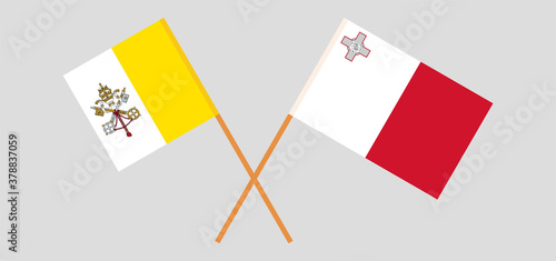 Crossed flags of Vatican and Malta