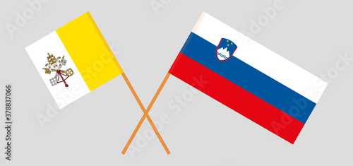 Crossed flags of Vatican and Slovenia