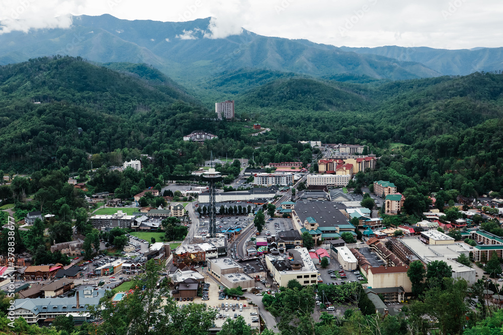 A high angle aerial view of Gatlinburg Tennessee and the Great Smoky Mountains