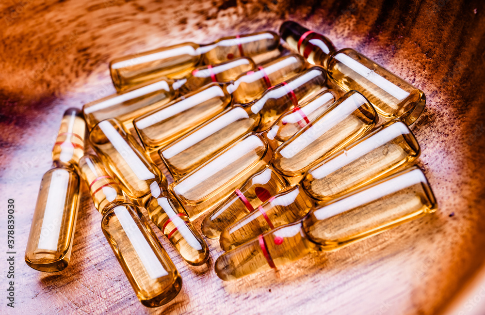 Naklejka premium Copy space photo medical ampoules on a white background. Close-up