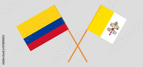 Crossed flags of Vatican and Colombia