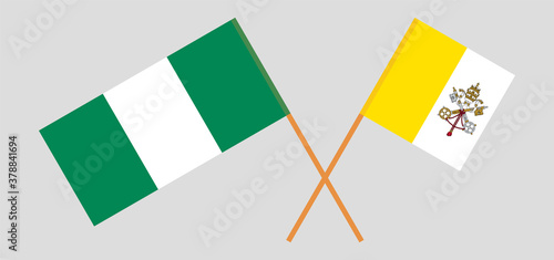 Crossed flags of Vatican and Nigeria