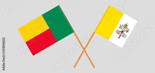 Crossed flags of Vatican and Benin