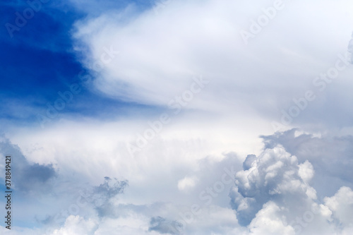 Divine sky. White fluffy clouds in the blue sky. Blue sky background with tiny clouds. Panorama © Elena