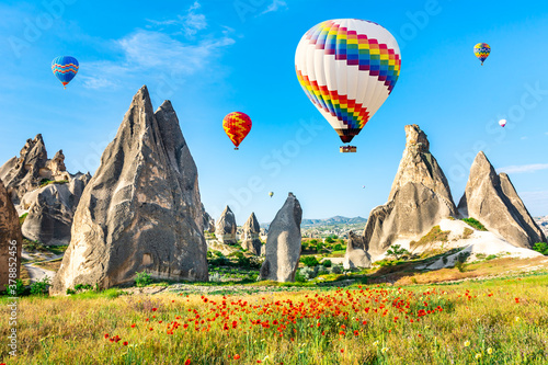 Travel concept. The great tourist attraction of Cappadocia - balloon flight. Cappadocia is the best places to fly with hot air balloons. Goreme, Cappadocia, Turkey. Artistic picture. Beauty world.