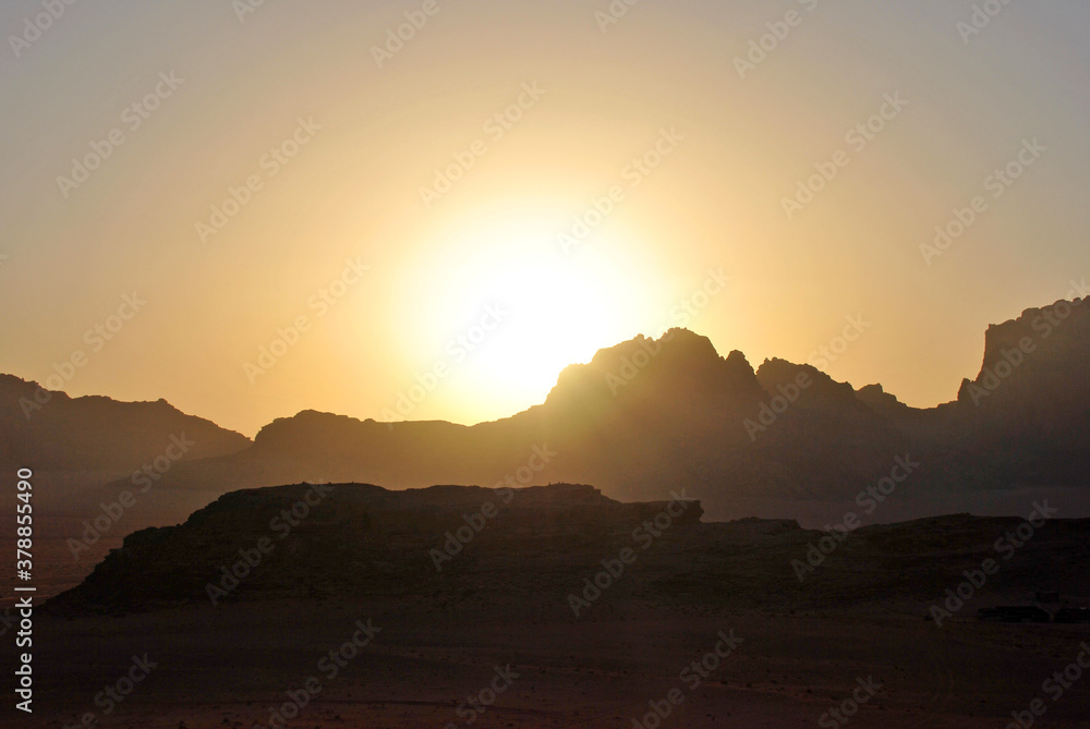 Sunset over the sandstone rocks in Wadi Rum, Jordan Sunset over the sandstone rocks in Wadi Rum, Jordan