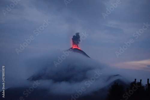Volcano El Fuego erupts at night outside of Antigua Guatemala