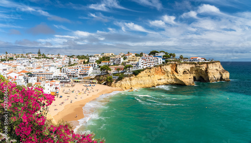 Landscape with beach in Carvoeiro town with colorful houses in Algarve, Portugal