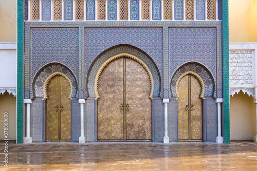 Golden doors and ornate tile work of the Royal Palace in Fez, Morocco  © Claudia