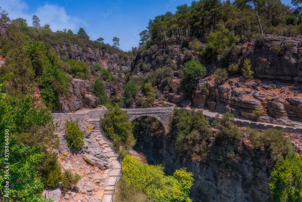 Koprulu Canyon. A view of Kopru River and Koprulu Canyon. National Park in the province of Antalya, south western Turkey. The canyon is crossed by the Roman Oluklu bridge. July 2020,long exposure shot
