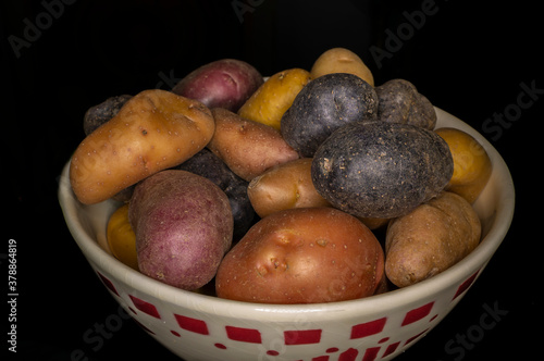 Otganic purple and brown potatoes photo