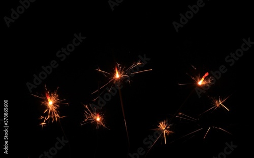 sparklers on a black background