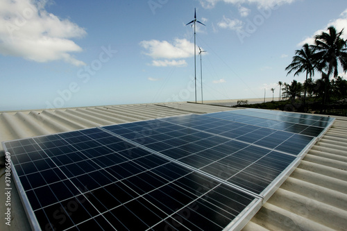 nova vicosa, bahia / brazil - september 8, 2009: solar energy generation plates are seen in a residence in the rural area of the city of Nova Vicosa, in southern Bahia.  photo