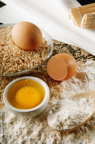Close-up of brown rice with flour and eggs