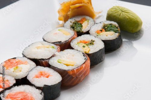 Close-up of sushi rolls with wasabi paste