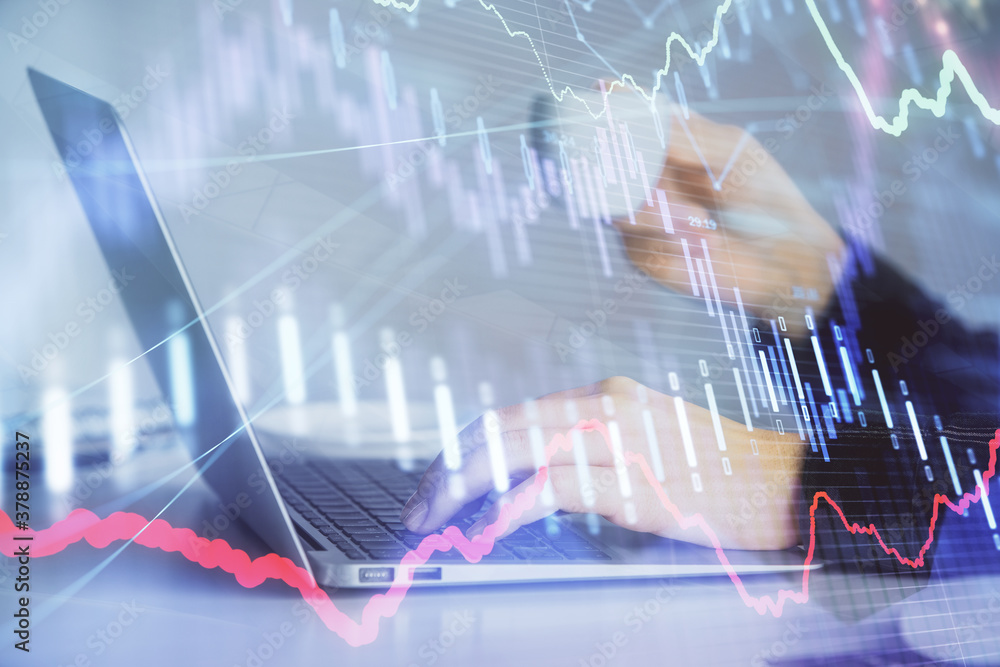Double exposure of businesswoman hands typing on computer and forex graph hologram drawing. Financial analysis concept. Double exposure of businesswoman hands typing on computer and forex graph hologram drawing. Financial analysis concept.