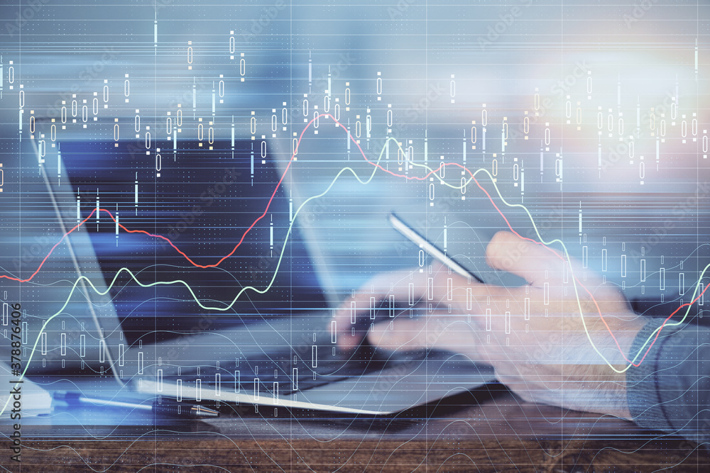 Double exposure of man's hands holding and using a digital device and forex graph drawing. Financial market concept. Double exposure of man's hands holding and using a digital device and forex graph drawing. Financial market concept.