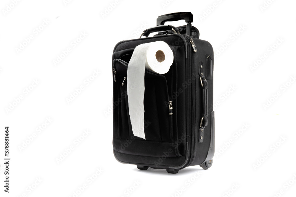 a roll of toilet paper in the cover of a black carry on suitcase isolated on white a roll of toilet paper in the cover of a black carry on suitcase isolated on white