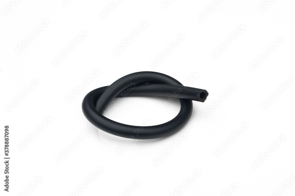 Black rubber fuel hose isolated on white background. Black rubber fuel hose isolated on white background.