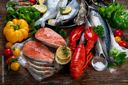 Fototapeta Naklejka Na Ścianę i Meble -  Fresh fish and seafood with vegetables