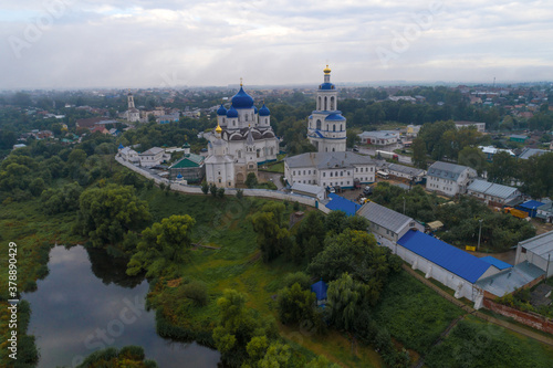 View of the Svyato-Bogolyubsky Convent on a cloudy August morning (aerial footage). Bogolyubovo, Russia