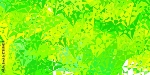 Light green  yellow vector background with polygonal forms.