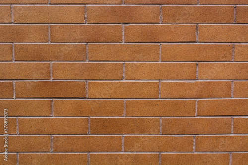 texture of a new clean smooth light brown brick