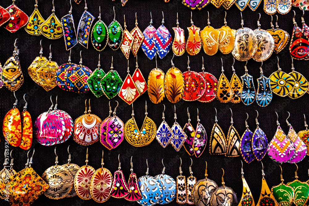 Granada, Spain. Dozens of handcrafted earrings on a black display stand in a street in Granada.