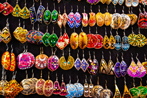 Granada, Spain. Dozens of handcrafted earrings on a black display stand in a street in Granada. © Alessandro