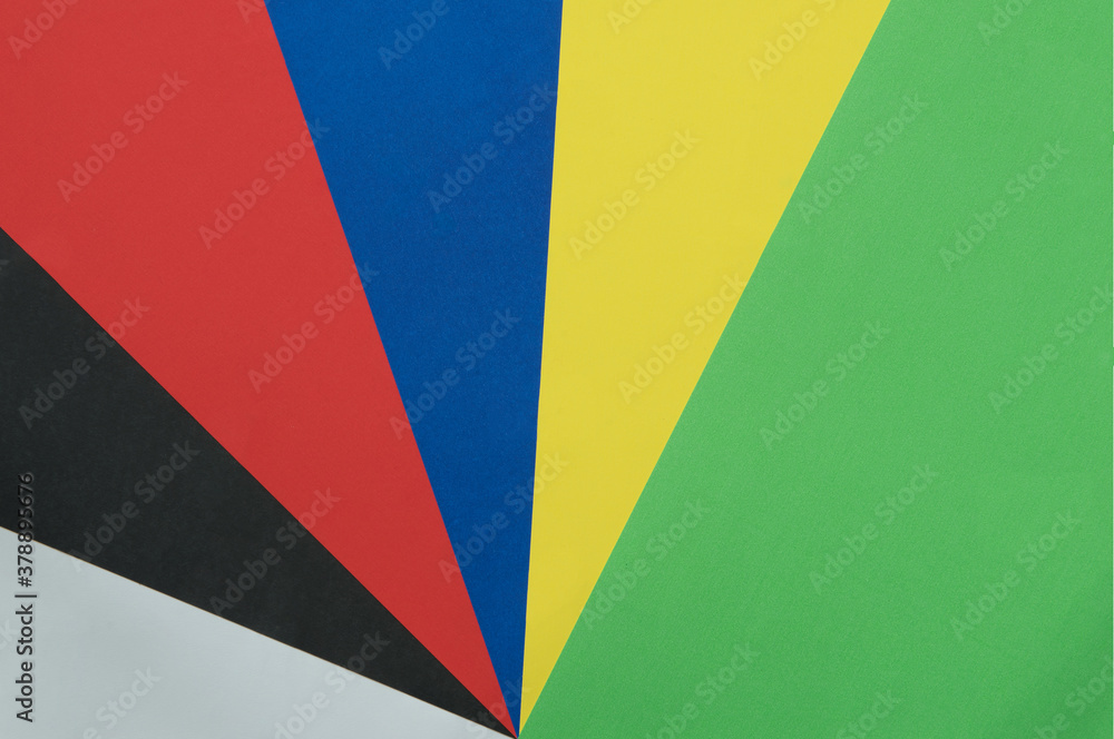 Obraz premium Green,yellow,blue,red,black,white color paper background,cardboard texture.