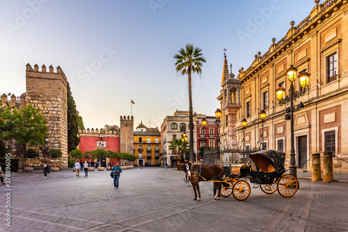 Seville, Spain. October 15th, 2020. Horse-drawn carriage waiting for tourists in Calle Miguel Mañara near the Porta del Leon, entrance to the Alcazar of Seville.