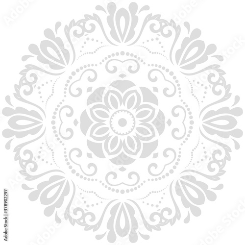 Oriental round light pattern with arabesques and floral elements. Traditional classic ornament. Vintage pattern with arabesques