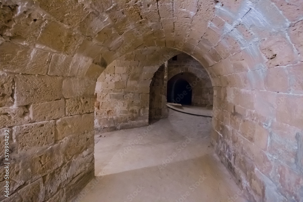 old stone castle corridor , medieval structure scene