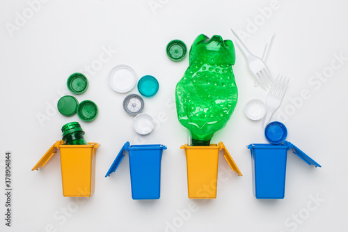 Wallpaper Mural Trash bins with separated trash plastic, paper, metallic, glass Torontodigital.ca