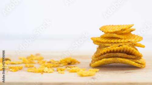 Close up potato chips on white background (food concept)