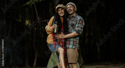 Summer holidays, love, romance and people concept. Couple in love. Forest background. Sensual. Smile. Fun. 
