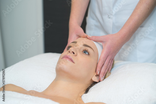woman having professional head massage