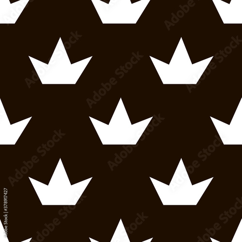 .A repeating pattern of white crowns on a black background; background of light objects on dark; fashionable pattern; cheerful pattern; blank for creativity; pattern for fabric and paper.