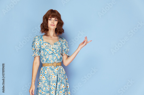 Woman in dress Smile hand gesture Copy Space short hair 