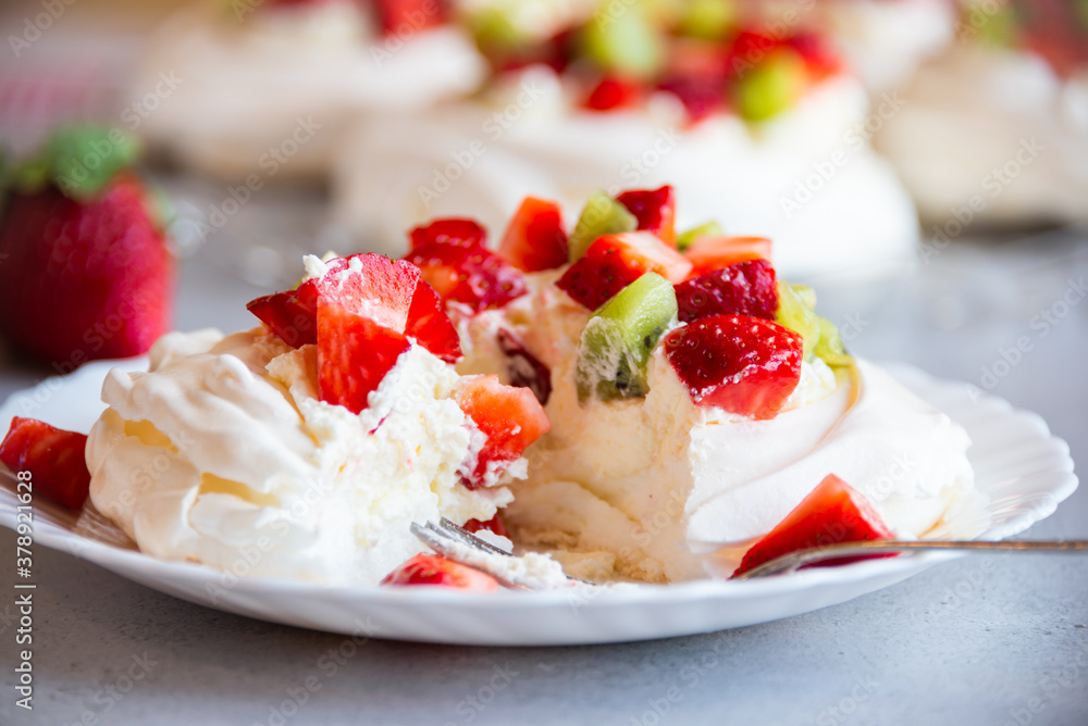 Delicious Pavlova cake with meringue and fresh fruit Delicious Pavlova cake with meringue and fresh fruit