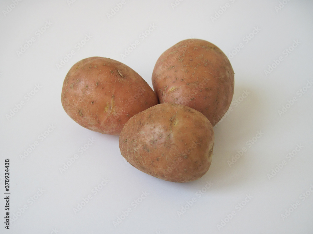 potatoes on a wooden table potatoes on a wooden table