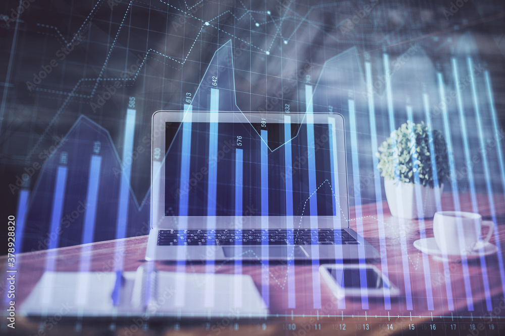 Forex market chart hologram and personal computer background. Double exposure. Concept of investment. Forex market chart hologram and personal computer background. Double exposure. Concept of investment.