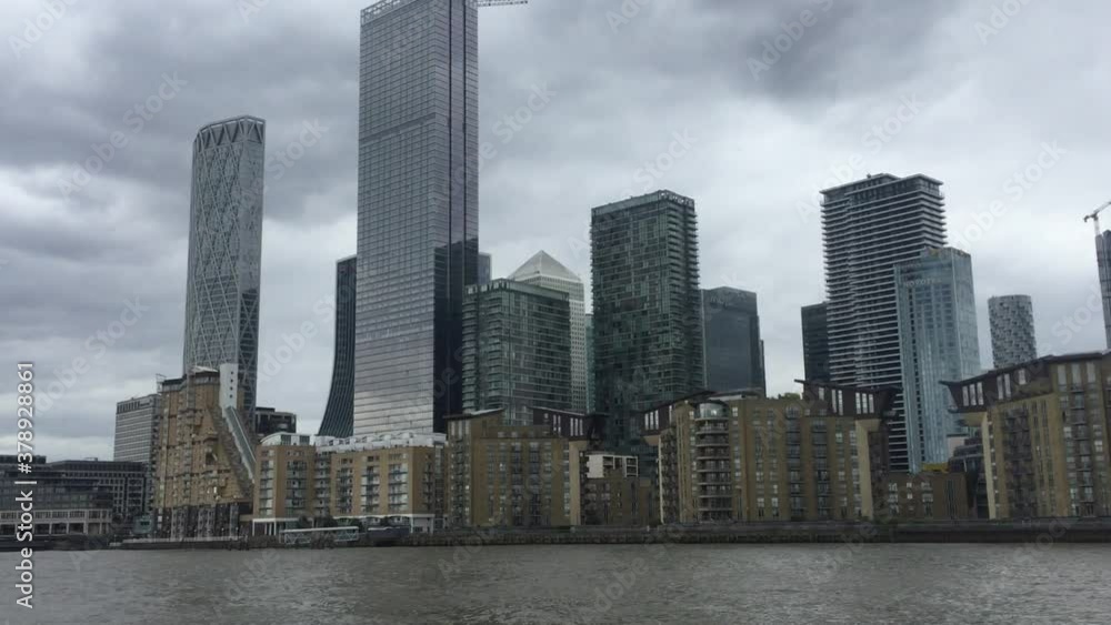Canary Wharf, London, UK, business district of London viewed from river - stock footage Canary Wharf, London, UK, business district of London viewed from river - stock footage