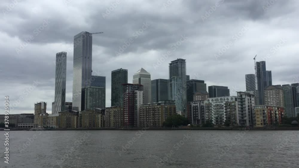Canary Wharf, London, UK, business district of London viewed from river - stock footage Canary Wharf, London, UK, business district of London viewed from river - stock footage
