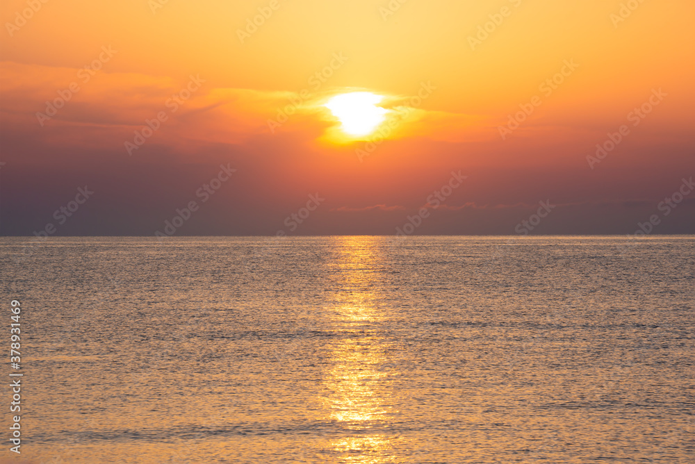 Beautiful orange sunrise or sunset at sea Beautiful orange sunrise or sunset at sea