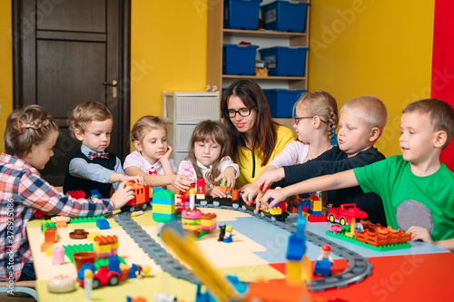 Educational toys for preschool and kindergarten child. Child playing with constructor blocks at class. © davit85